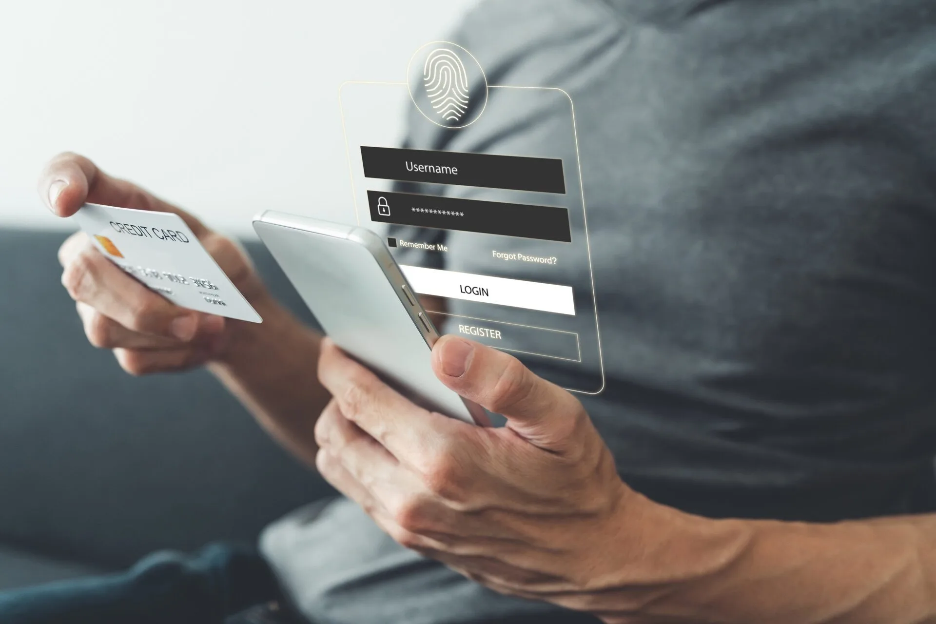 Kaltenbach Gruppe – Eine Person, die eine Kreditkarte und ein Smartphone in der Hand hält, mit einem virtuellen Anmeldebildschirm, der die Felder für den Benutzernamen, das Passwort und das Fingerabdrucksymbol anzeigt - ideal für Geschäftskunden, die Online-Zahlungen oder Bankgeschäfte sicher abwickeln. – BMW, MINI, KIA, BMW Motorrad & Honda Motorrad Partner in NRW